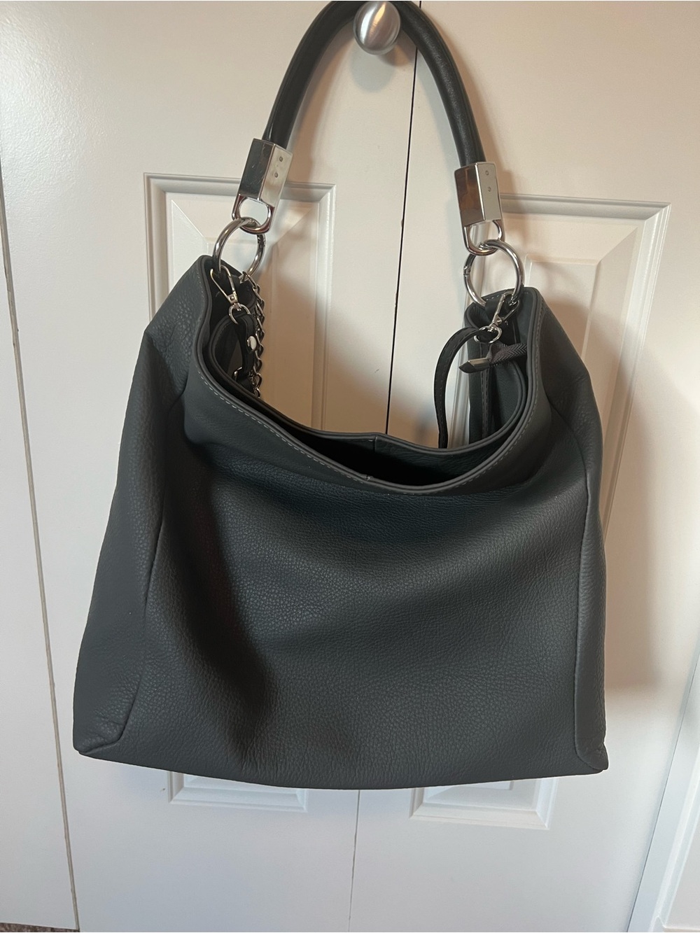 Sleek Black Pebbled Shoulder Bag with Silver Accents
